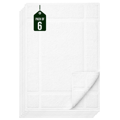 Pearl Linens white cotton mats maintain a clean, elegant bathroom look.