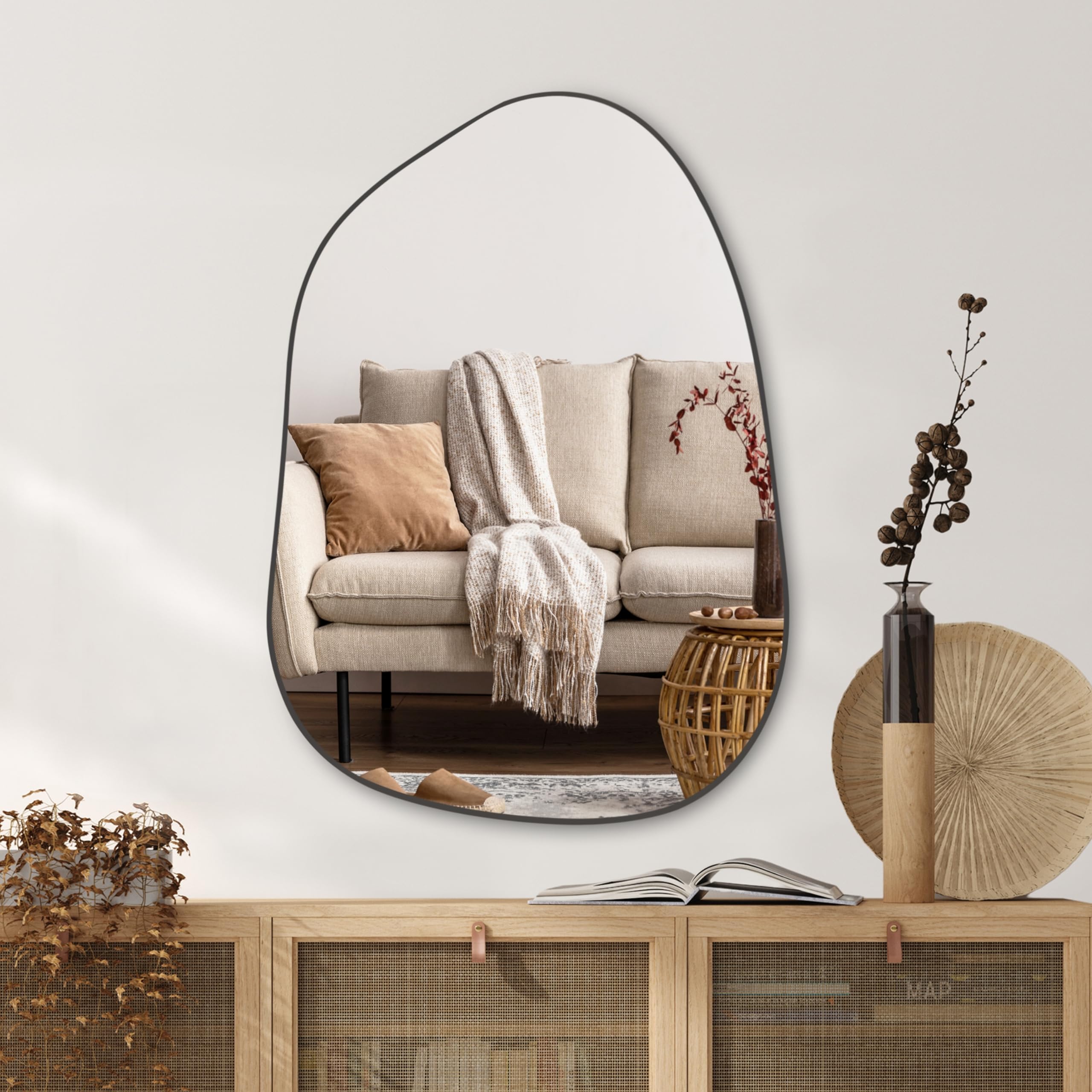 PERFNIQUE irregular wall mirror 27x19 in black adds modern style.