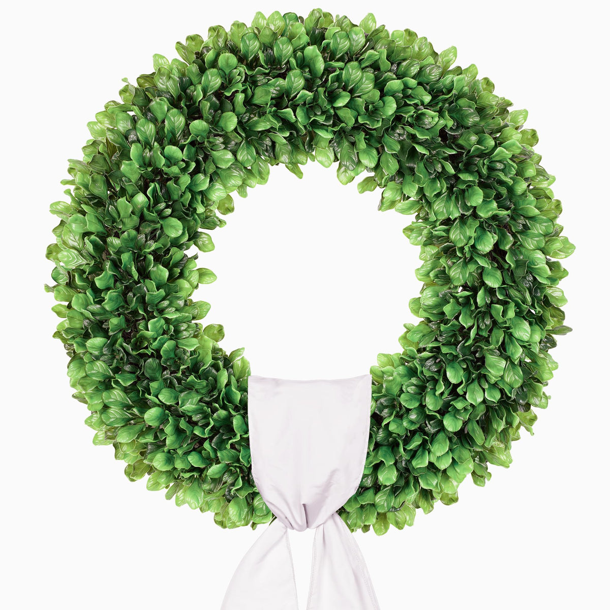 Petalyn boxwood wreath on a front door adds year-round curb appeal.