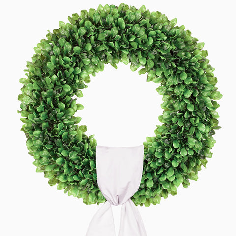 Petalyn boxwood wreath on a front door adds year-round curb appeal.