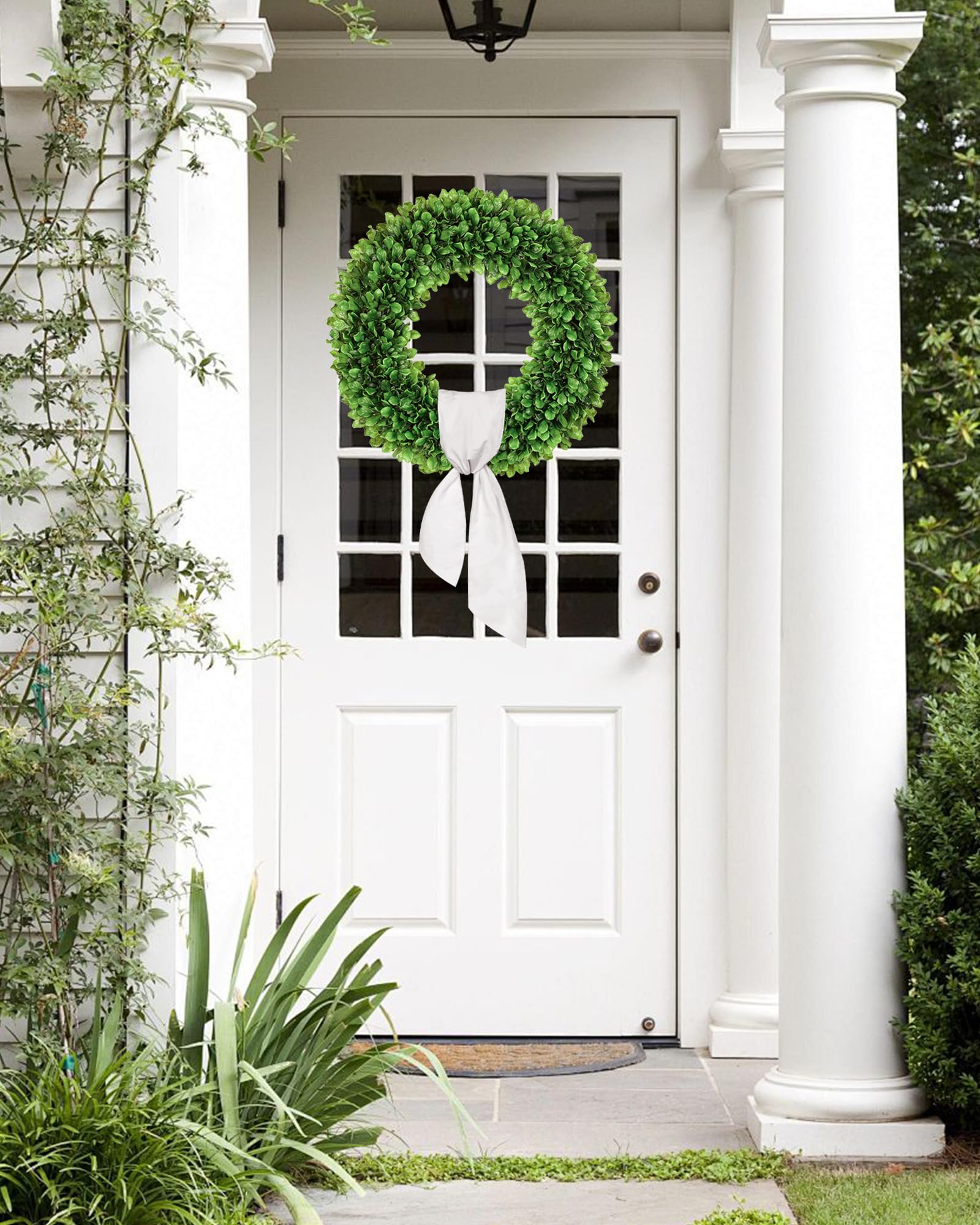 Petalyn boxwood wreath with sash included for easy styling on entrances.