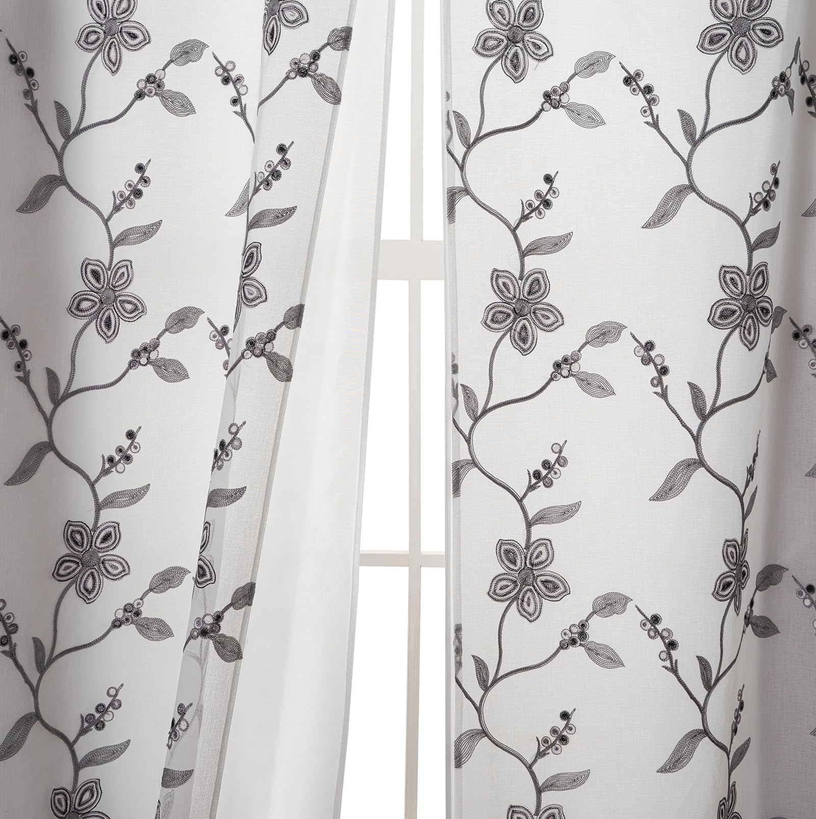 Petrichor sheer curtain filters daylight while preserving privacy.