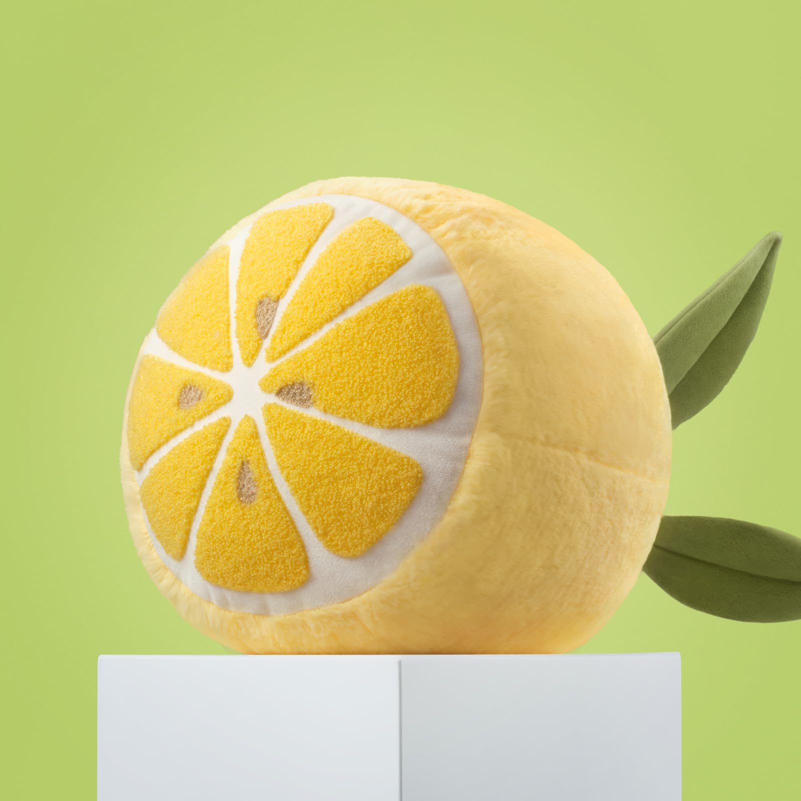 Phantoscope Lemon-shaped Throw Pillow front view with plush velvet texture for bright couch decor.