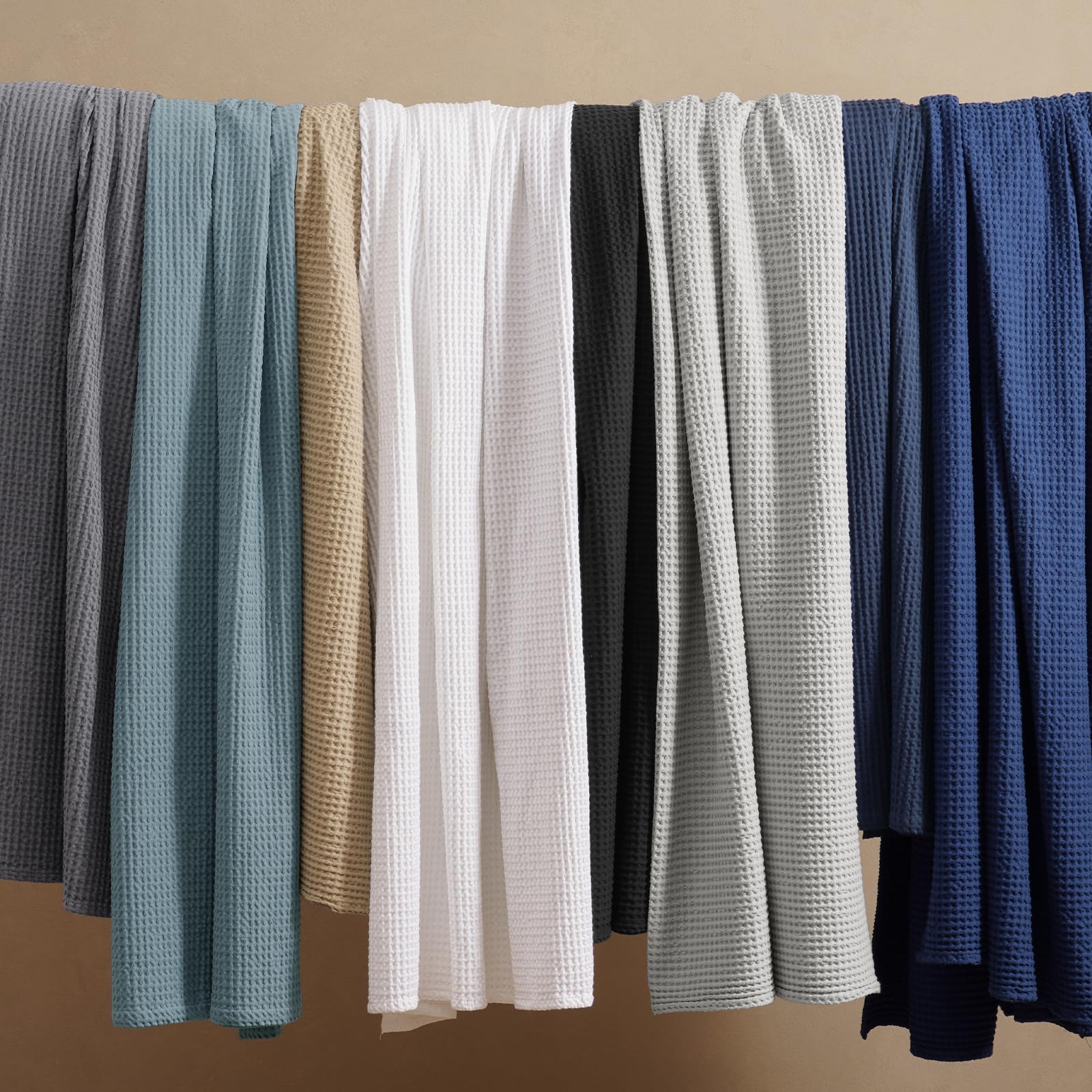 PHF white waffle blanket enhancing bedroom decor with a clean look.