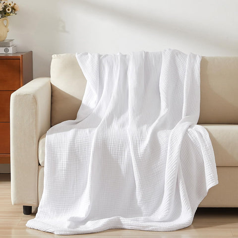 PHF muslin blanket care guide: cold wash and low tumble dry.