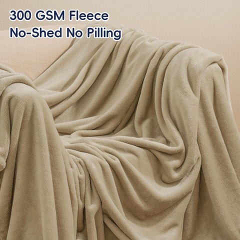 PHF khaki blanket used as room decor accent and cozy throw