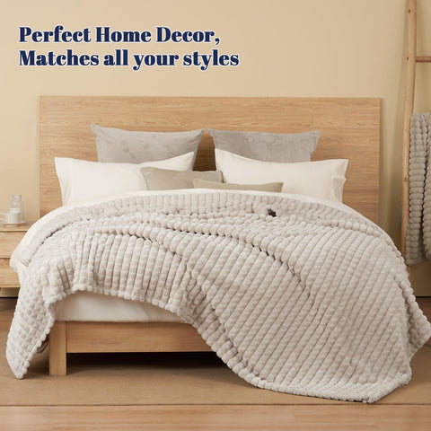 PHF versatile comfort blanket in a stylish bedroom setting