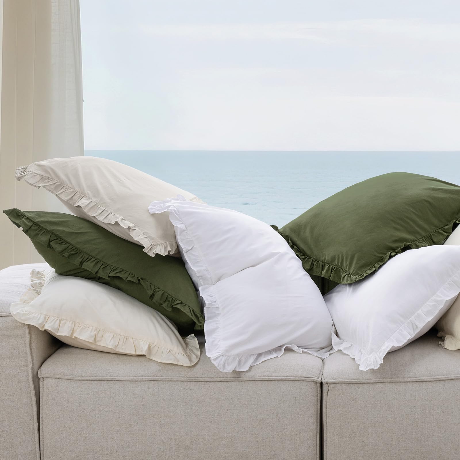 PHF white euro sham displayed on a bed for versatile styling.