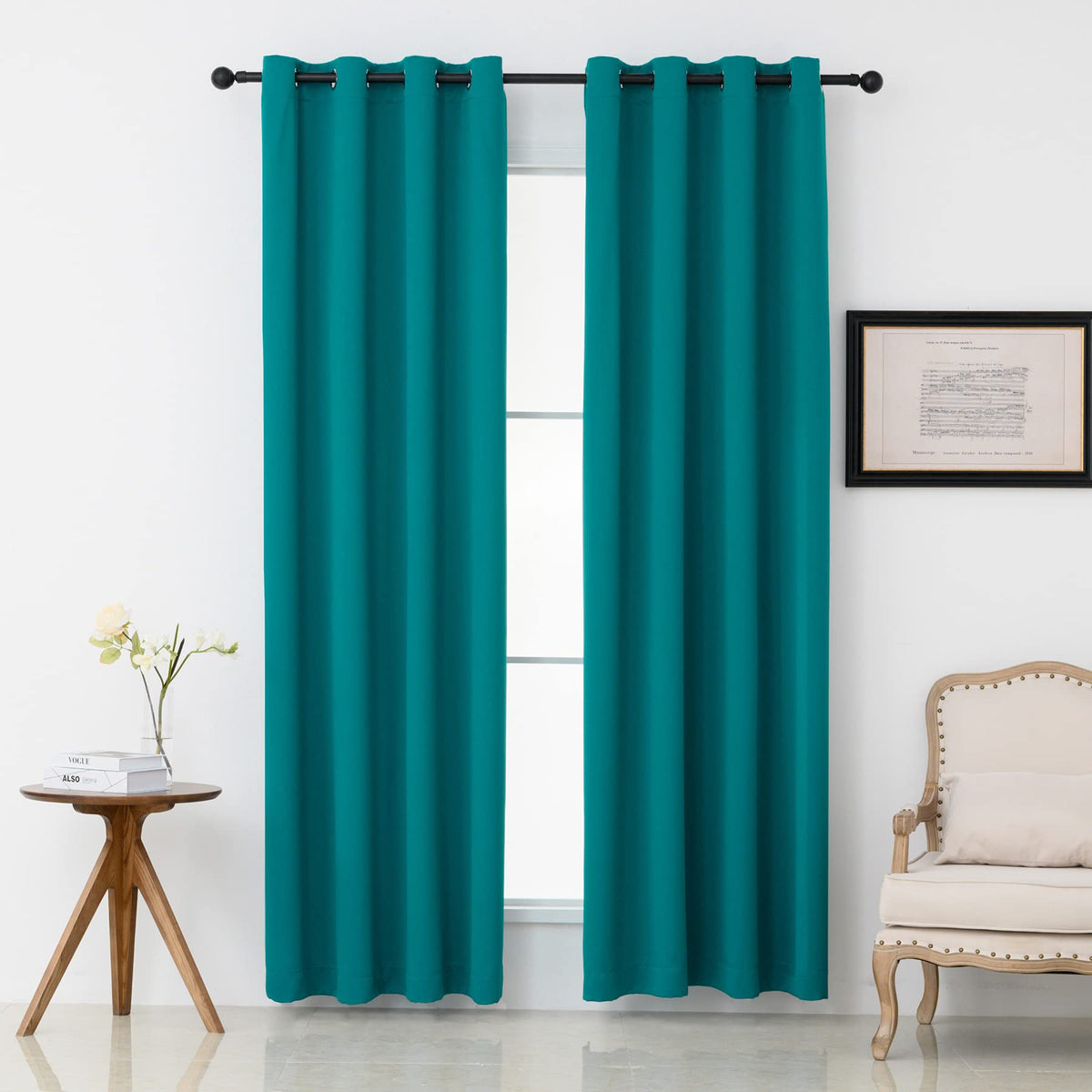 Pickluc teal blackout curtains with grommets, two-panel arrangement for privacy and room darkening.