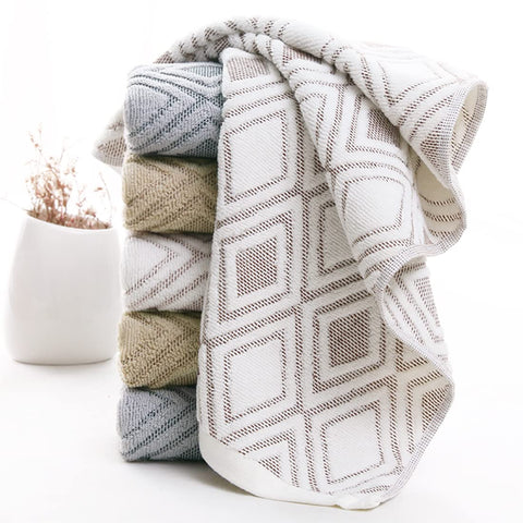 Pidada 4-pack towels draped on a bathroom rack for quick use.