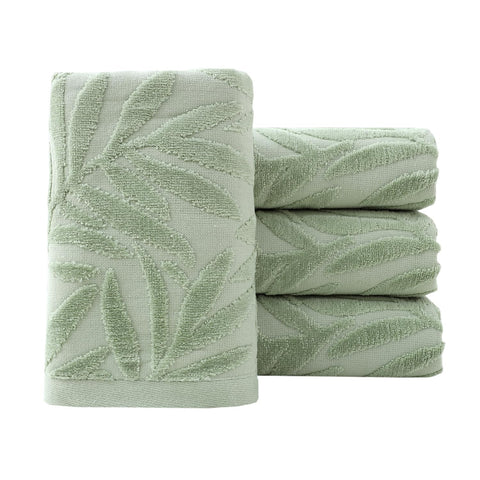 Pidada leaf-pattern hand towels in green, soft cotton for everyday comfort.