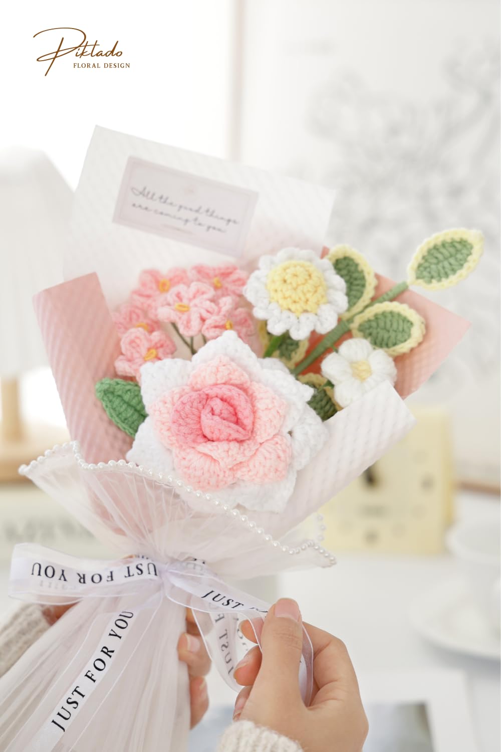 Piklado crochet bouquet close-up highlights handcrafted flowers designed for elegant gifts.