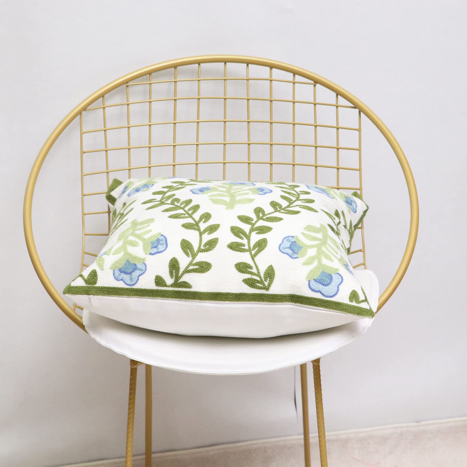 Pilmandu pillow covers complement farmhouse decor on sofa or bed.