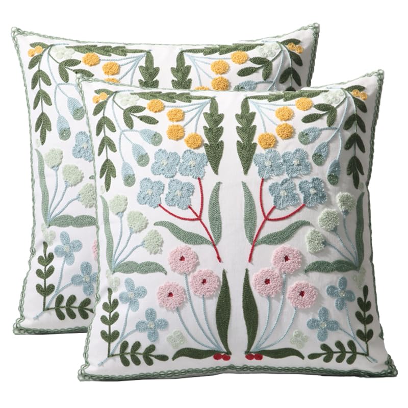 Pilmandu embroidered floral blue 18x18 pillow cover adds subtle texture to your sofa.