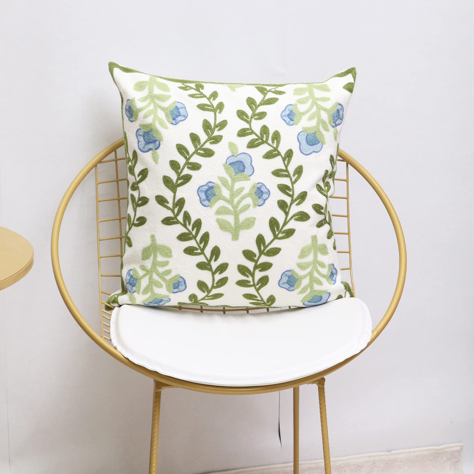 Pilmandu embroidery detail on one side creates a refined focal point.
