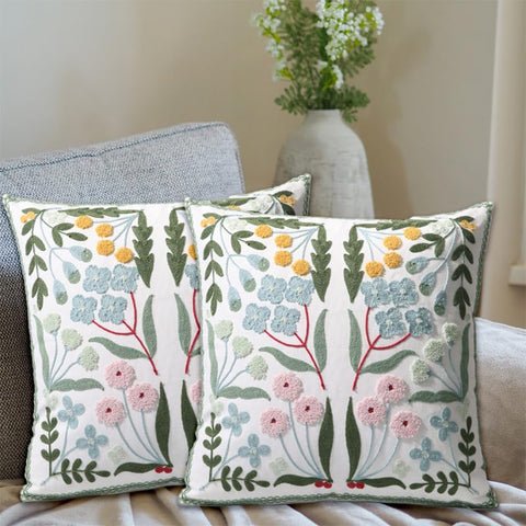 Pilmandu two-pack embroidered pillow covers in blue floral elevate living room decor.