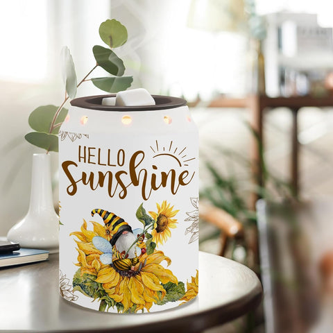 Pinata ceramic sunflower wax warmer with soft glow for cozy ambiance.