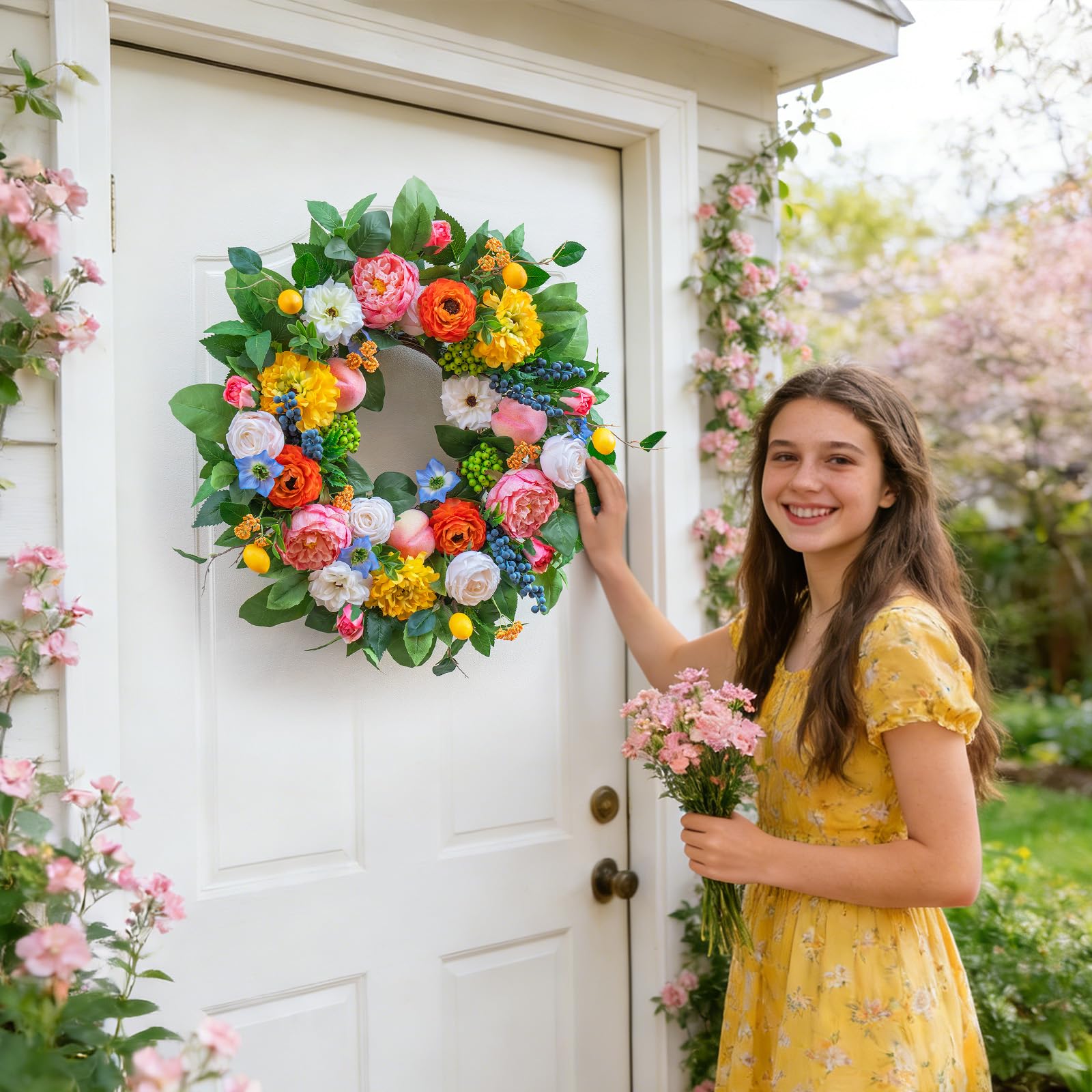 Pinkpuii wreath with peaches, lemons, and blueberries adds vibrant fruit accents.
