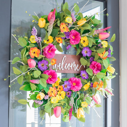 Pinkpuii wreath closeup reveals vibrant color and lifelike blossoms.