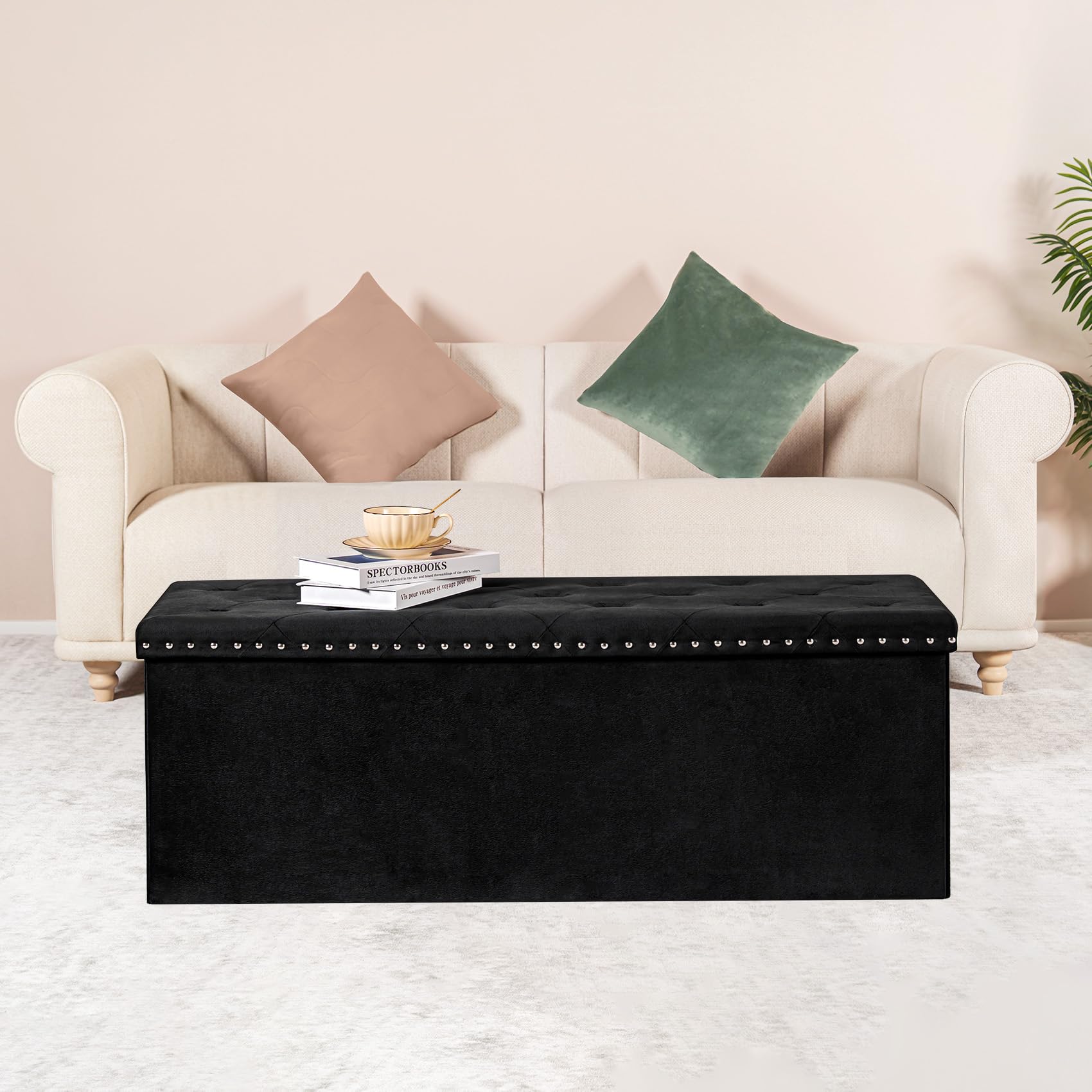 PINPLUS storage ottoman open shows spacious interior for blankets and toys.