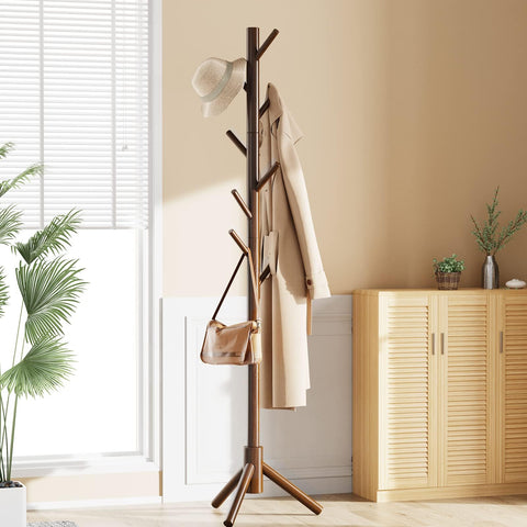 Pipishell coat tree placed in a bedroom corner beside desk.