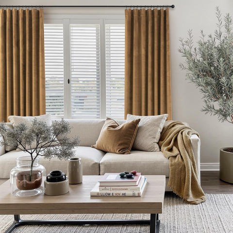 Pitalk royal gold-brown velvet fabric adds luxury and warmth to a living room.