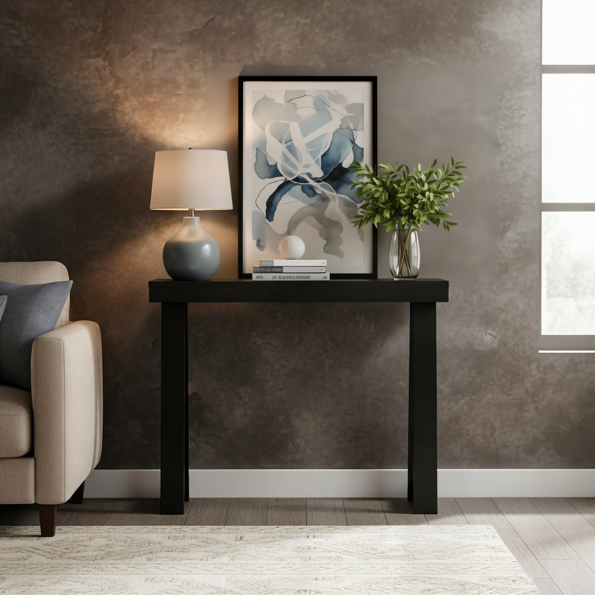 Plank+Beam console table front view highlights sleek black finish and clean lines.