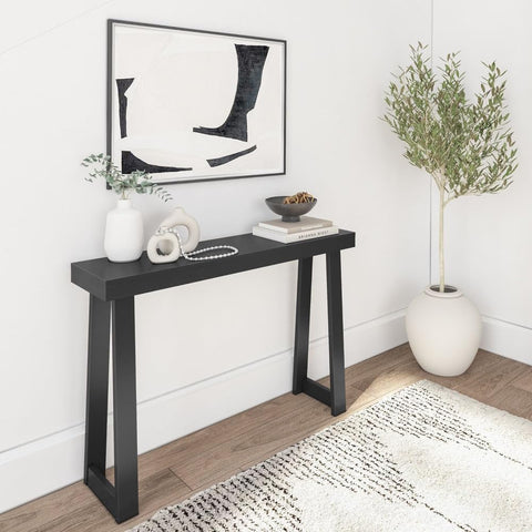 Plank+Beam knot-free solid pine wood design emphasizes durability for living rooms.