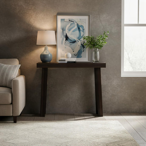Plank+Beam walnut console table side view in a narrow space