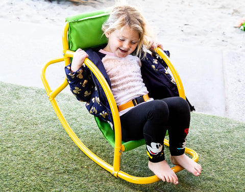 PLATPORTS backyard scene captures kids enjoying a safe, engaging outdoor activity.