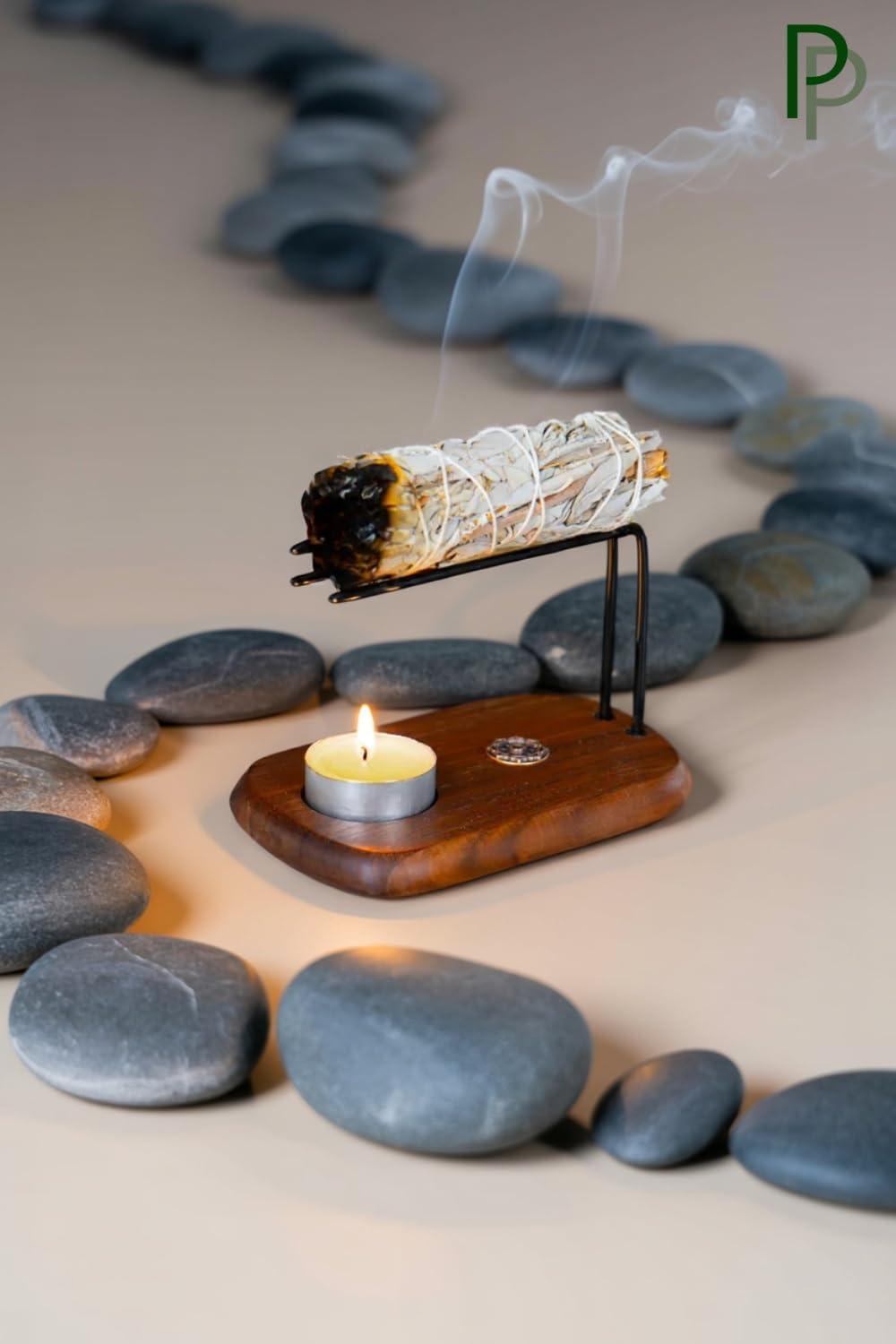 Plearty holder with adjustable rods accommodates Palo Santo and sage bundles