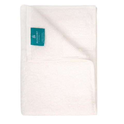 Pleasant Home white towels bring a clean look to bathrooms.