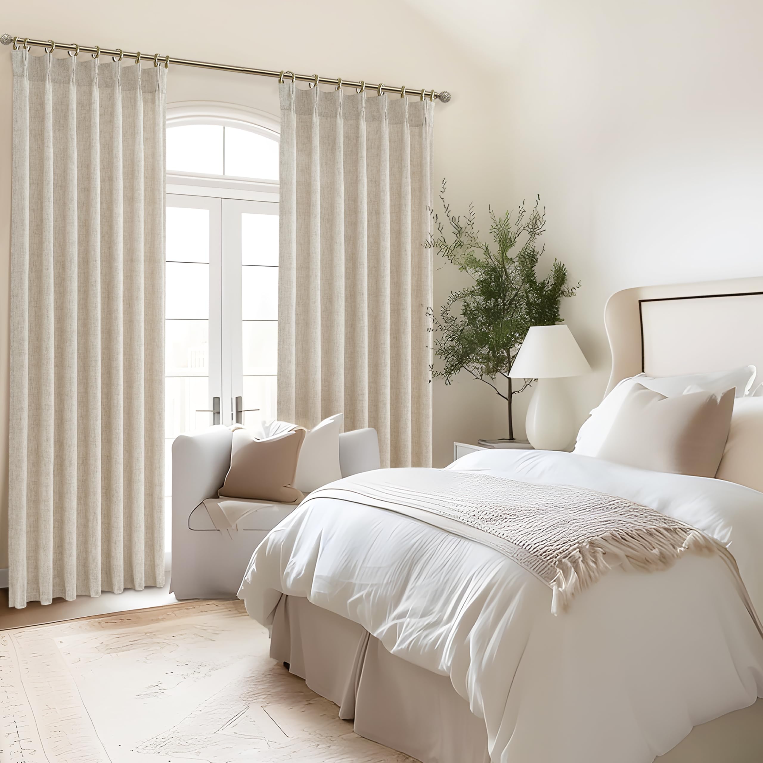 PleatedDrapes pinch pleat design highlights a tailored ceiling-to-floor profile.