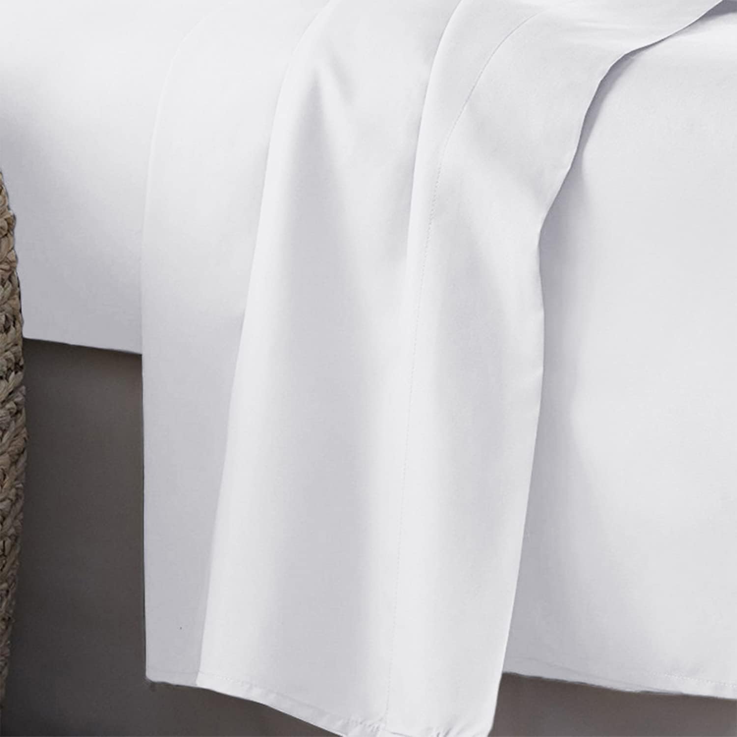 PLUSHY COMFORT white flat sheet highlighting soft, breathable feel for night comfort