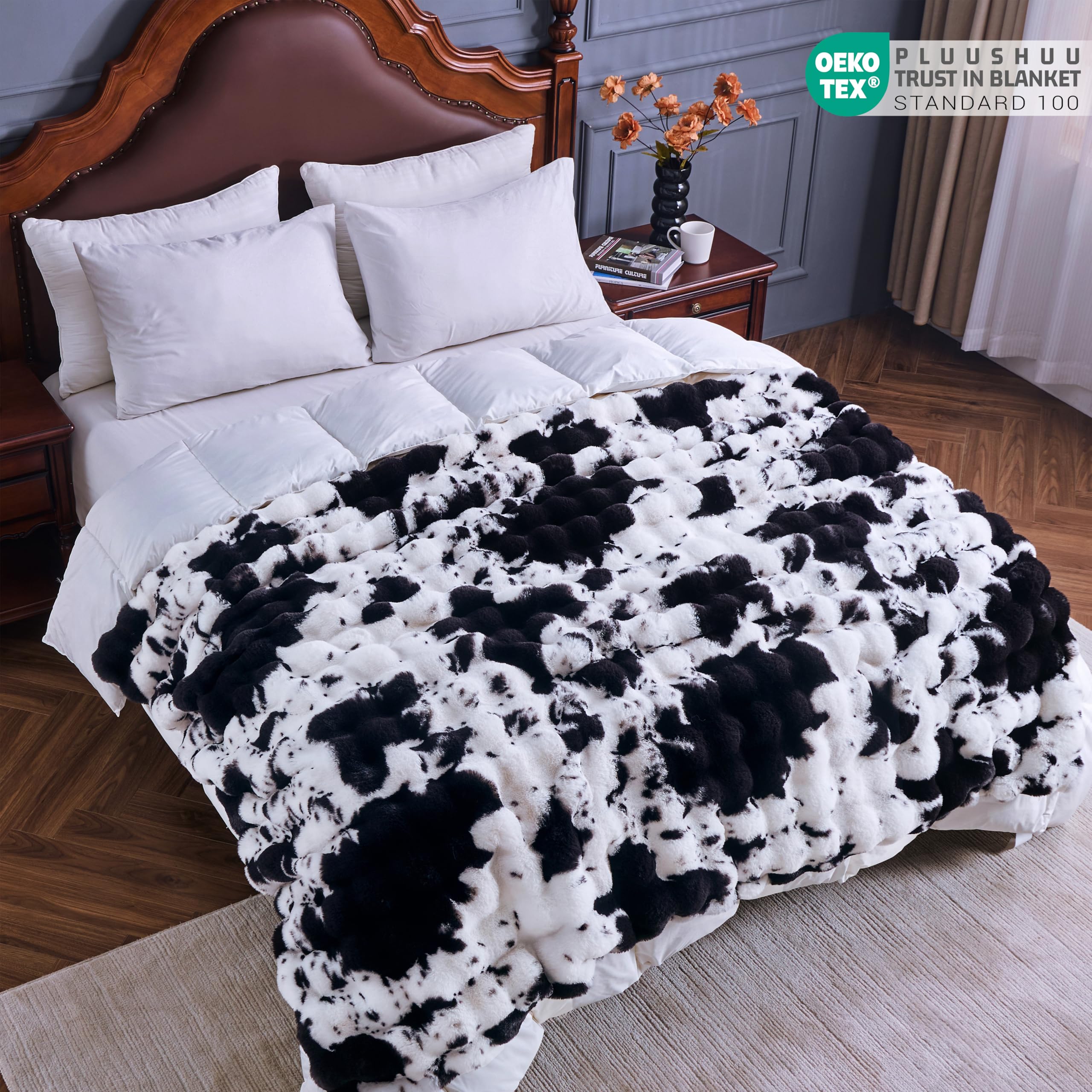 PLUUSHUU 60x50 inch blanket offers generous coverage for shared lounging.