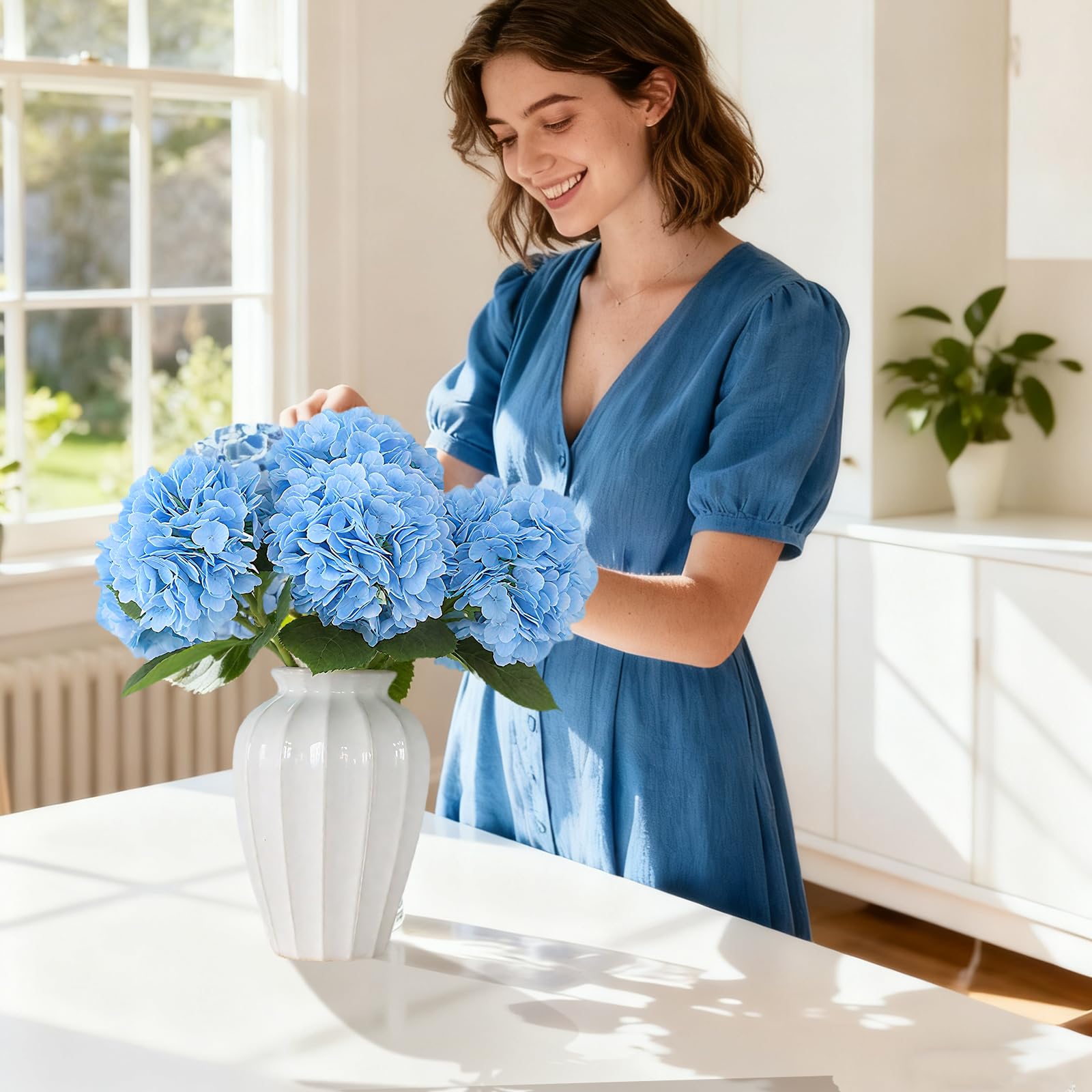 Pmyra blue hydrangea centerpiece idea for weddings and home decor inspiration.