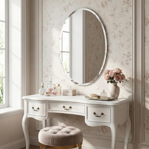 Pocetry bevel-edged oval mirror close-up adds refined light-catching detail to vanities.