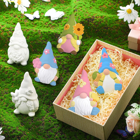 Poen gnomes being painted at home, great for family activities.