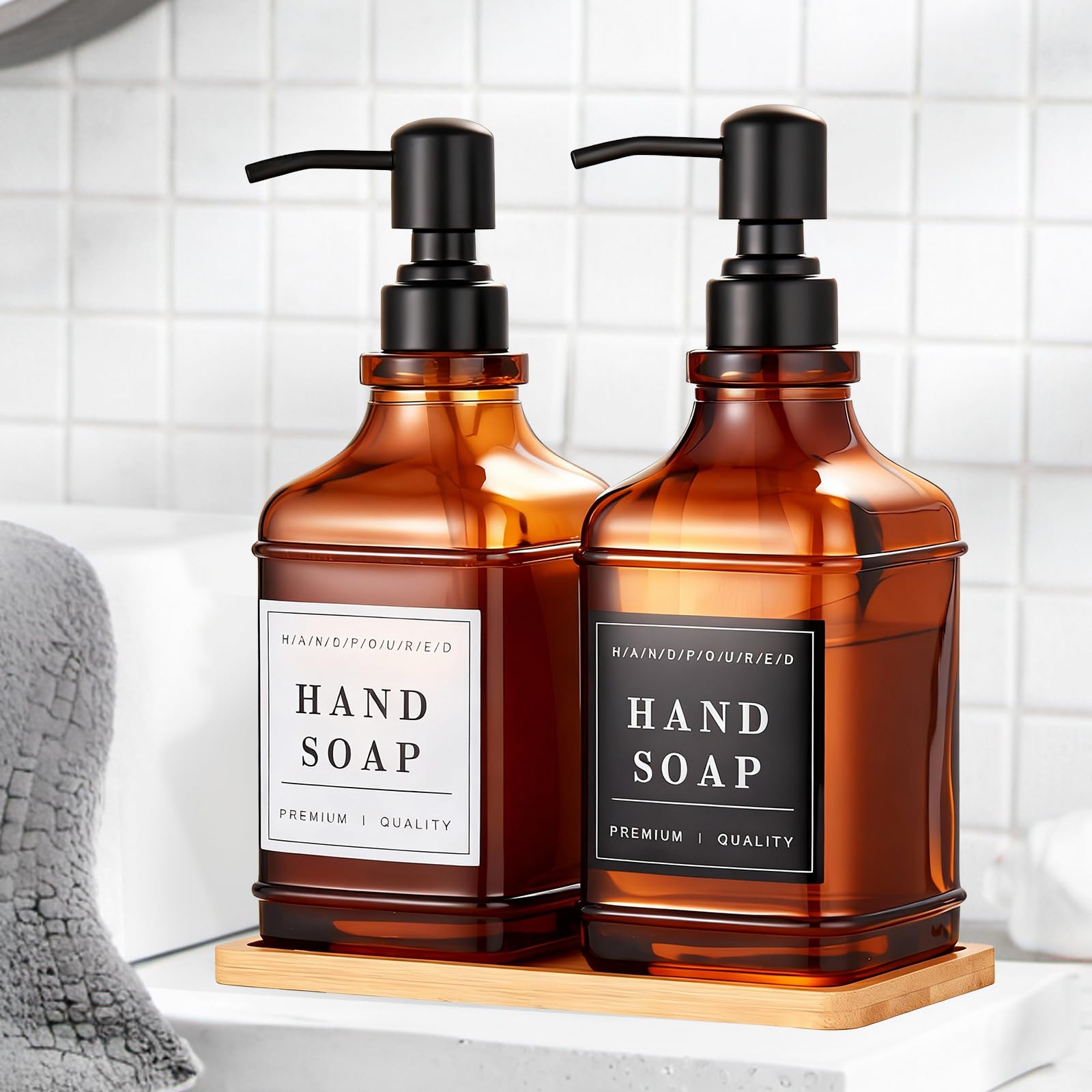 Pollock two-bottle amber glass dispenser set in a tidy configuration.