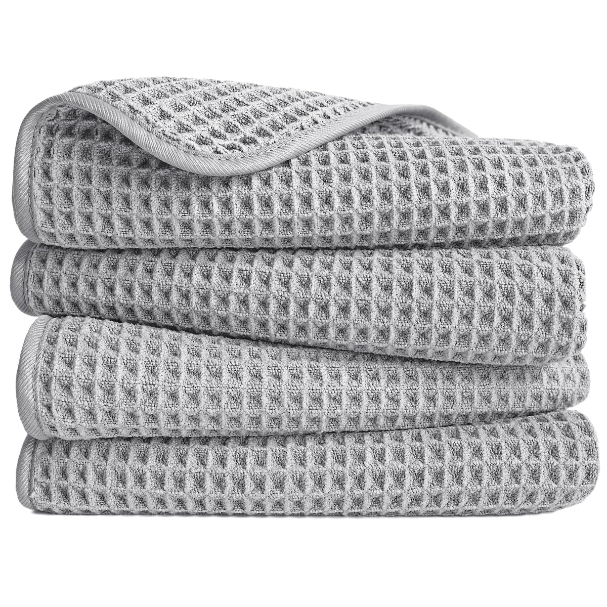 POLYTE microfiber hand towel folded to show waffle weave for quick, lint-free drying.