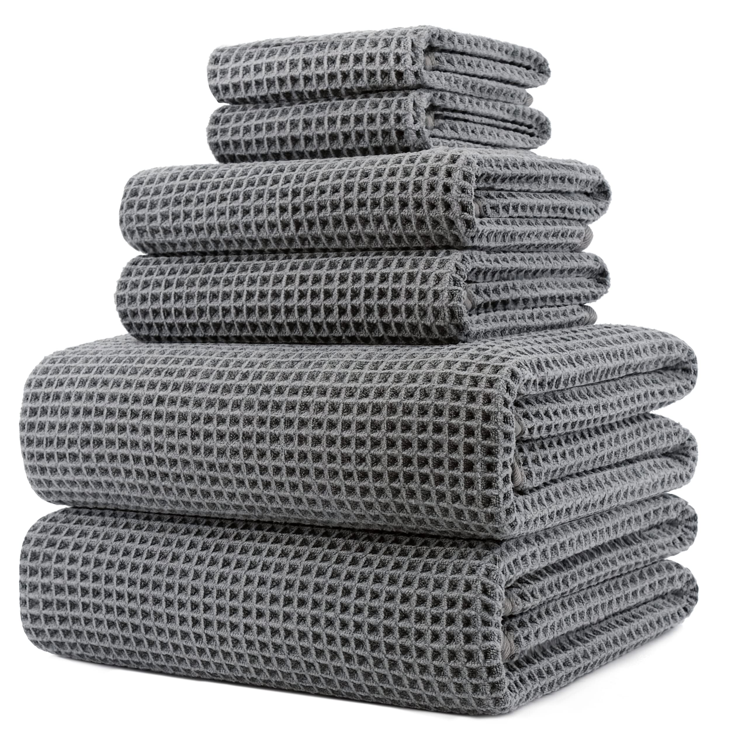 POLYTE bath towel 30x60 inches in waffle weave for quick drying and plush feel.