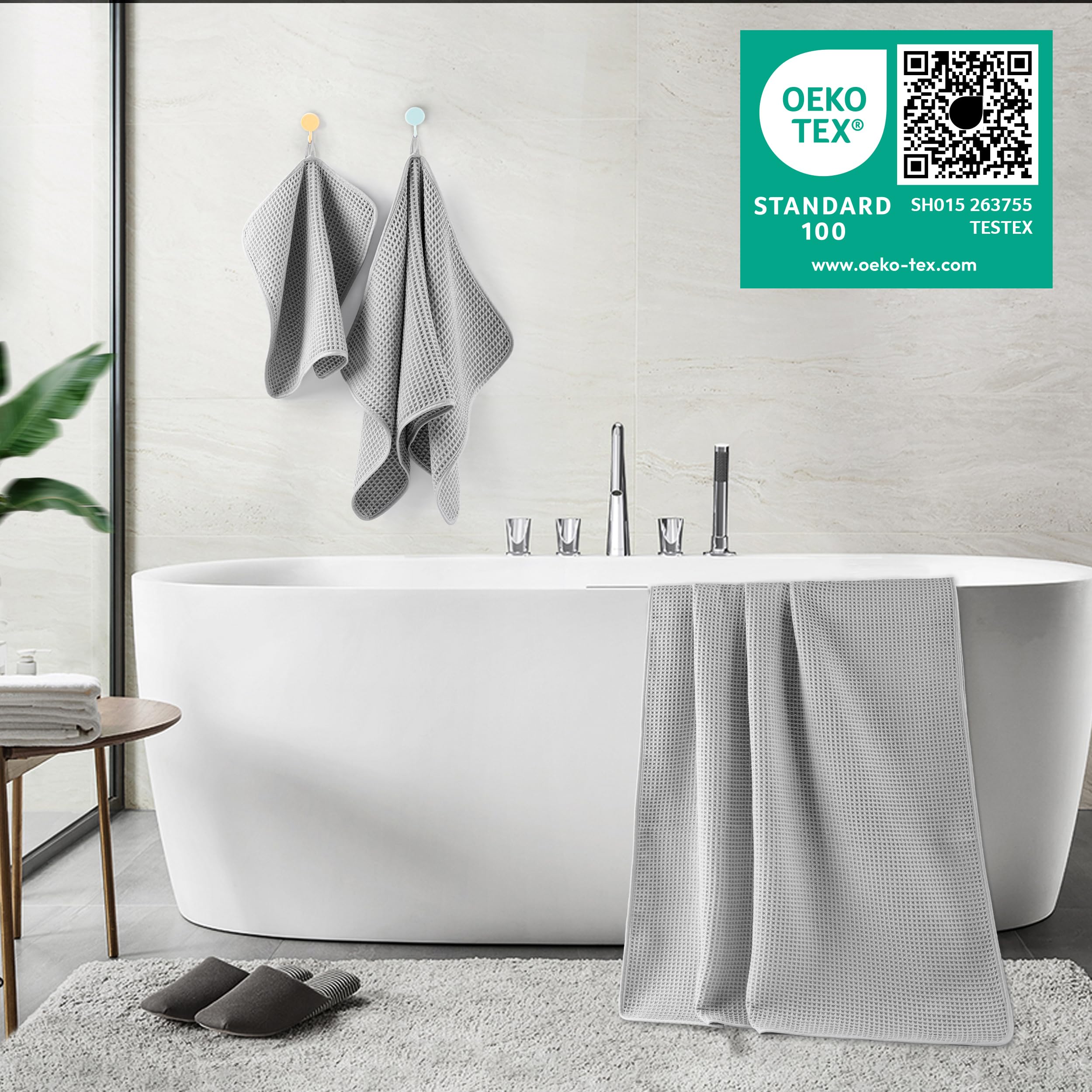 POLYTE deluxe bath towel 30x60 inches laid out on rack, showcasing generous size