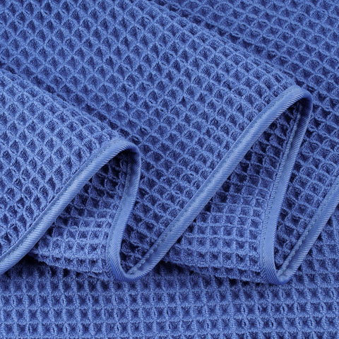 POLYTE four-towel pack offers practical laundry and storage solution.