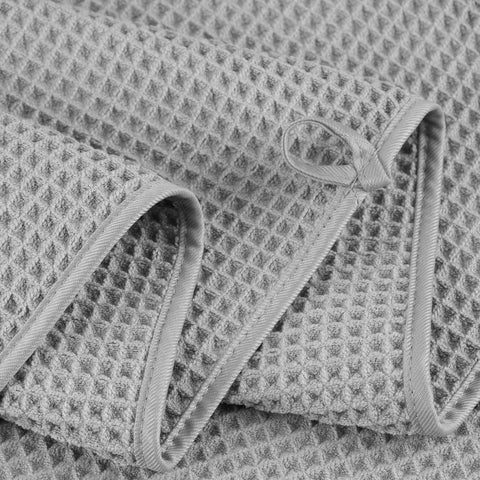POLYTE hand towel in waffle weave dries quickly and neatly with hanging loop.