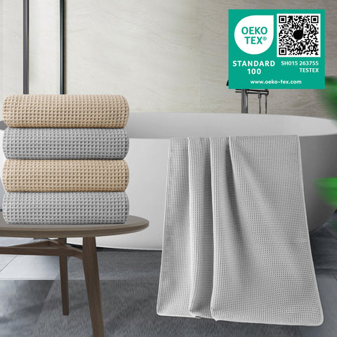 POLYTE satin-trim edge on bath towel emphasizes premium finish and lint resistance.