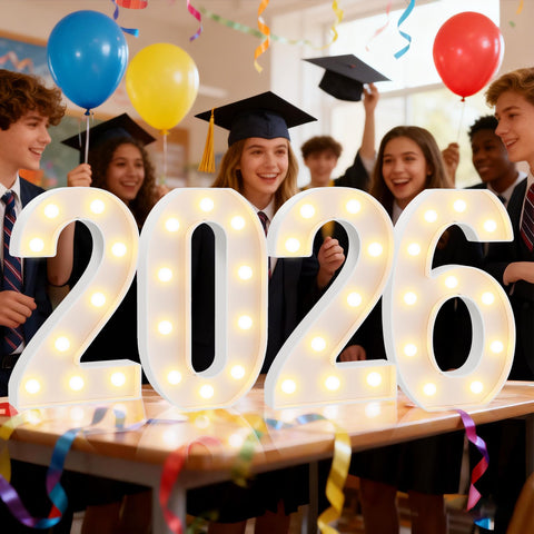 Pooqla Giant 2026 numbers illuminate graduation moment with warm light.