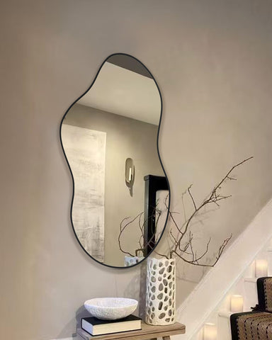 Potijo aluminum-frame mirror stays sturdy without bulk, elevating hallways and vanity areas.