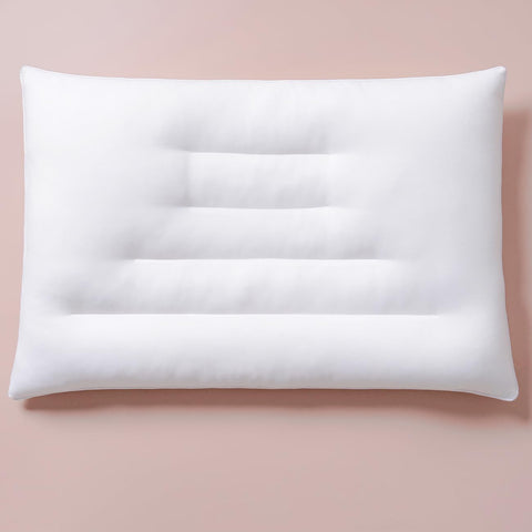 Pozino flat thin pillow shows 2.5-inch height ideal for stomach sleepers.