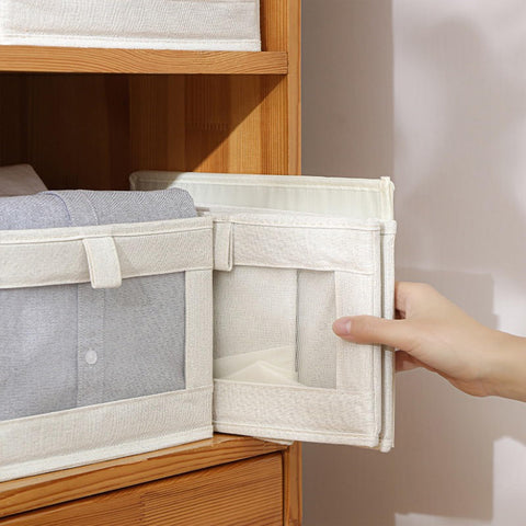 Pradnel wardrobe organizer bins fit shelves neatly.