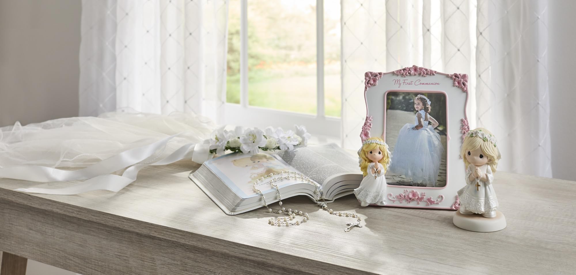 Precious Moments gift ready packaging makes a thoughtful First Communion keepsake.